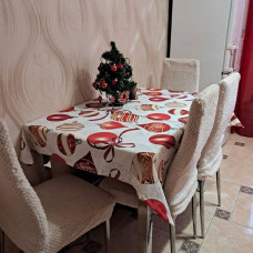 Скатертина новорічна Milana Новорічні іграшки 21450 110х140 см біла з червоним